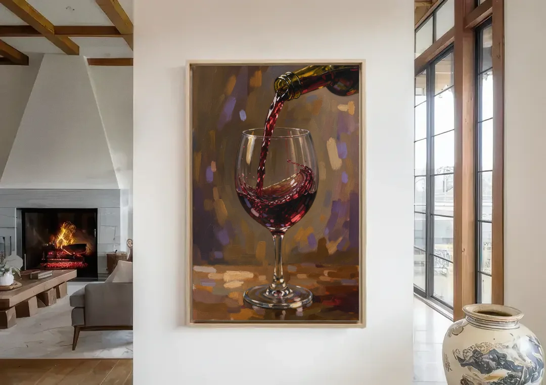 Wine Glass Wall Art with a Swirling Red Pour canvas wall art in a living room with a fireplace