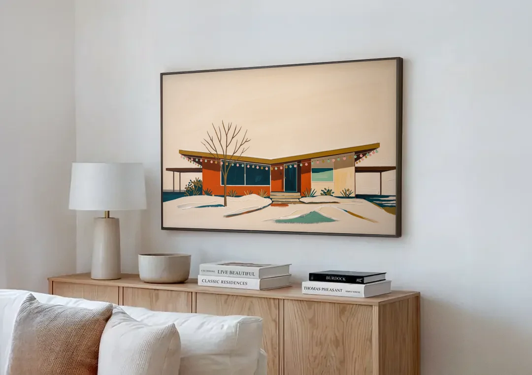 Winter Christmas Painting of a Butterfly Roof Ranch canvas wall art above a wooden sideboard next to a sofa