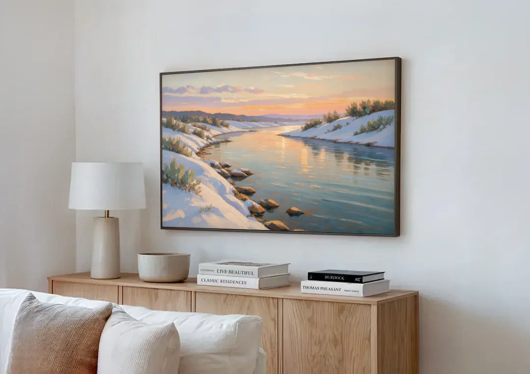 Winter River Painting at Dusk canvas wall art above a wooden sideboard next to a sofa