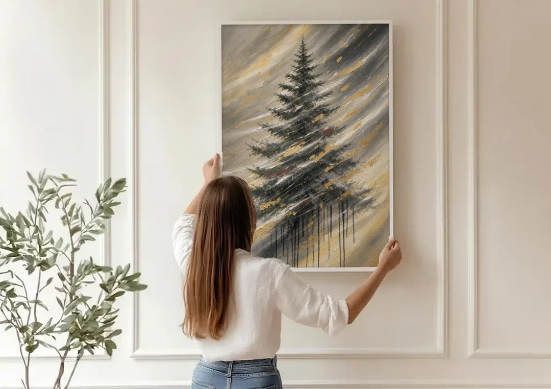 Contemporary Christmas Winter Tree in a Gold Blizzard canvas wall art being hung on a paneled wall