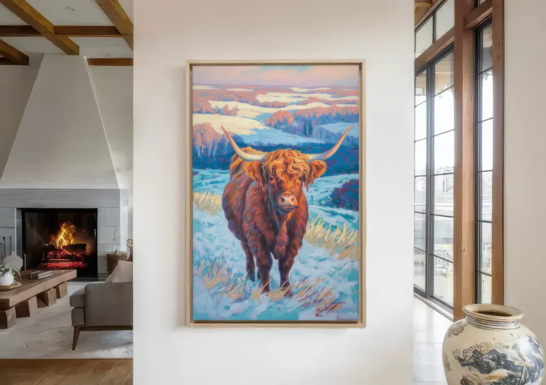 Winter Wonderland Highland Cow canvas wall art in a living room with a fireplace