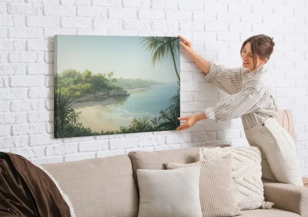 Xcaret Shoreline canvas wall art being hung on a white brick wall above a sofa