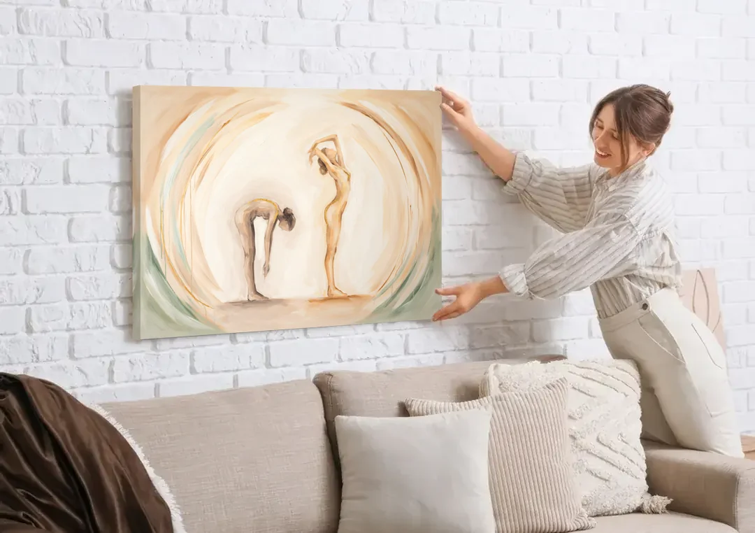 Yoga Painting of Forward Fold and Backbend canvas wall art being hung on a white brick wall above a sofa