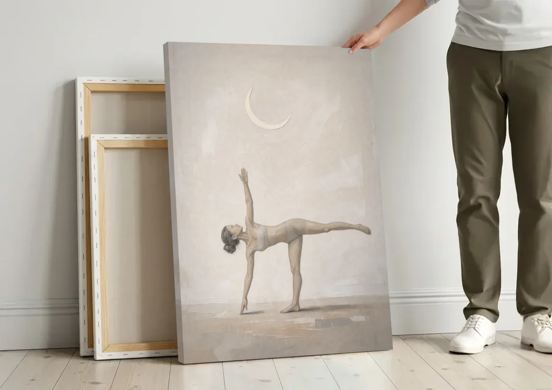 Yoga Studio Decor with Half Moon Pose Under Crescent canvas wall art leaning against a wall next to blank canvases