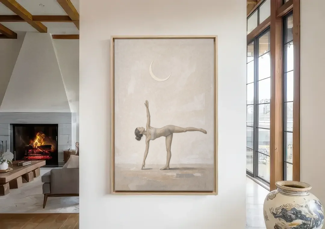 Yoga Studio Decor with Half Moon Pose Under Crescent canvas wall art in a living room with a fireplace