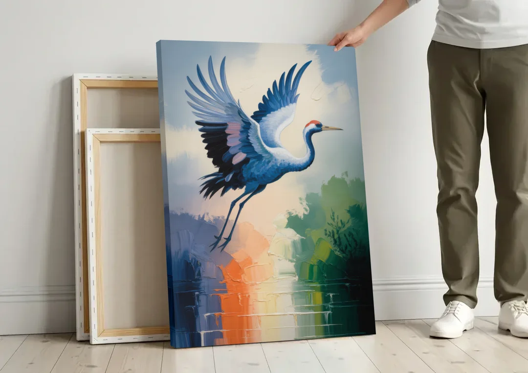 Zen Crane Calm canvas wall art leaning against a wall next to blank canvases